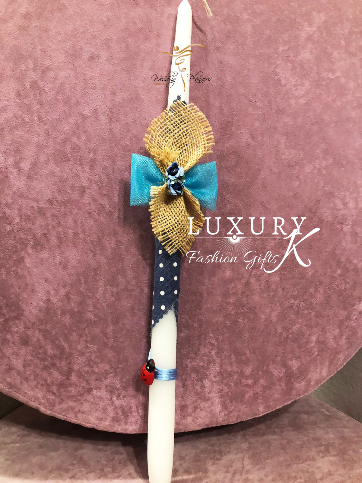 Easter Candle with bow tie & Flowers.